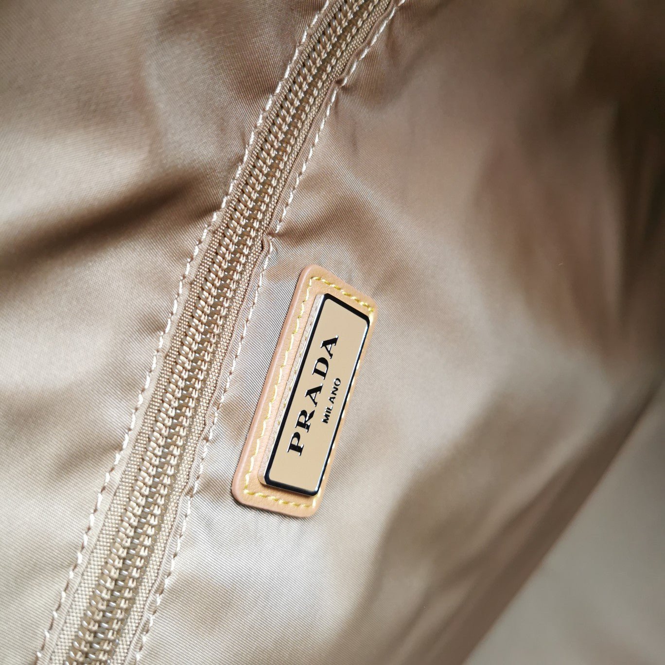 ＰＲＤＡ RE-NYLON AND LEATHER DUFFEL BAG CORK BEIGE