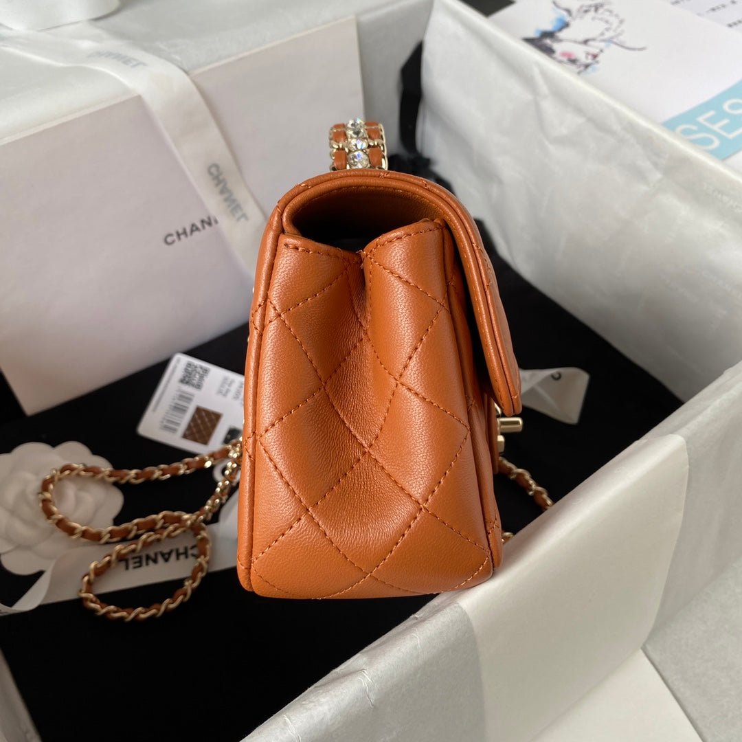 ＣＨＮＥＬFLAP BAG WITH TOP HANDLE RUST