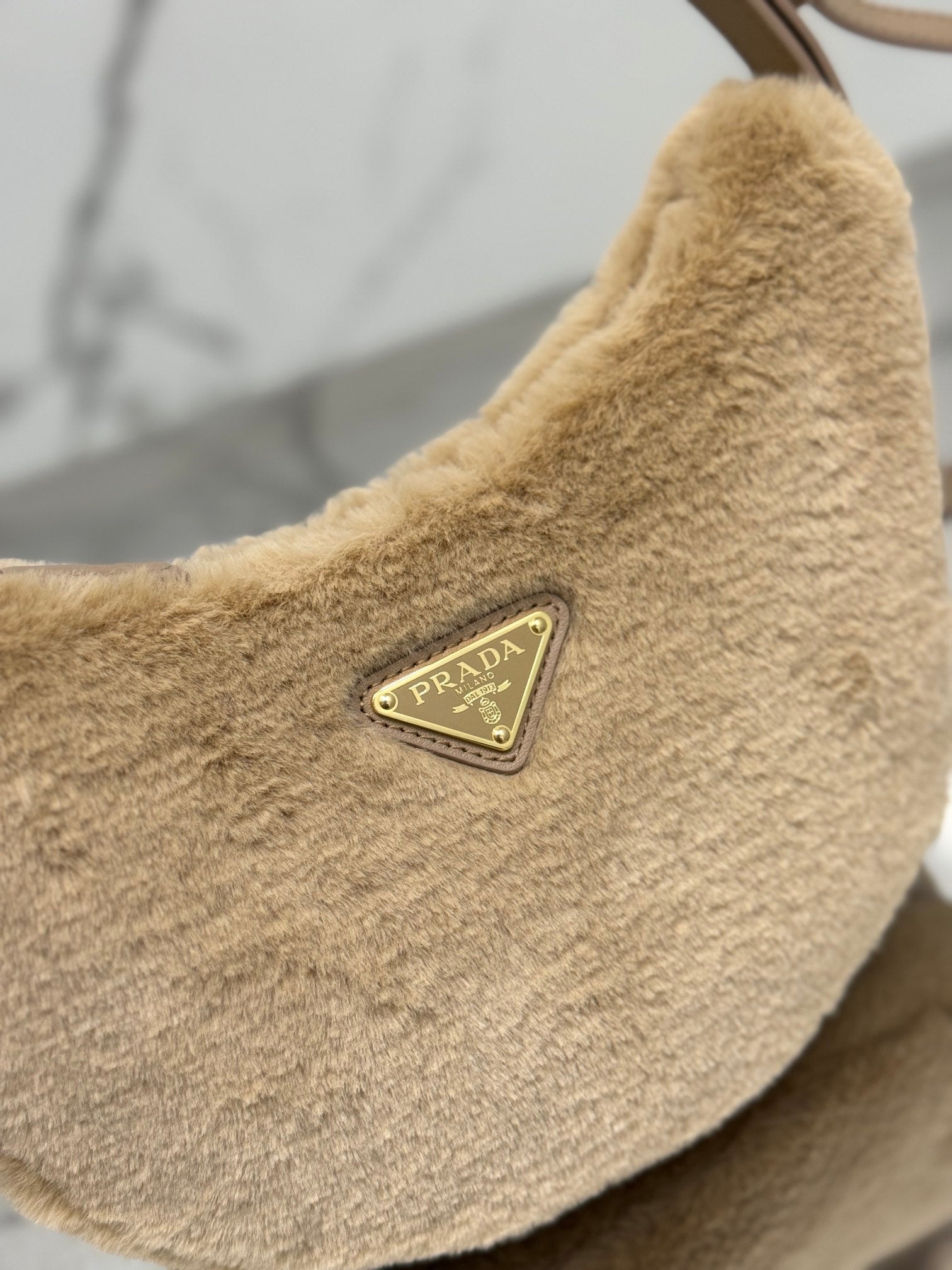 ＰＲＤＡ ARQUÉ SHEARLING AND LEATHER SHOULDER BAG