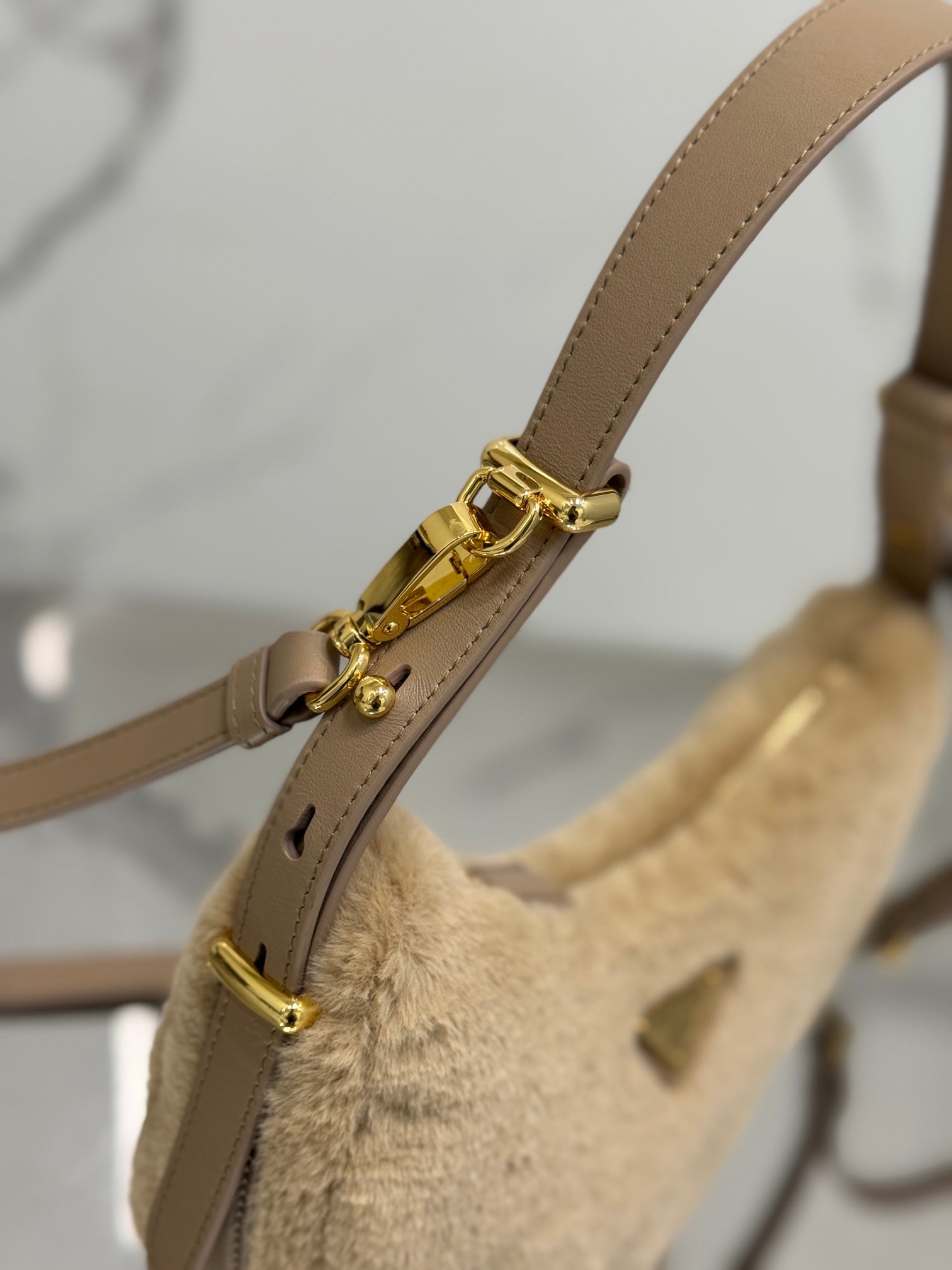 ＰＲＤＡ ARQUÉ SHEARLING AND LEATHER SHOULDER BAG